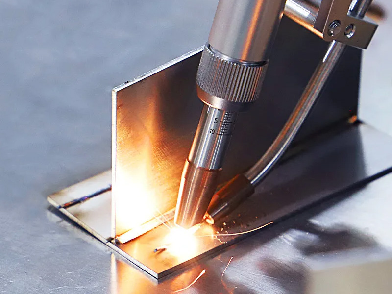 Laser welding a fabricated metal assembly