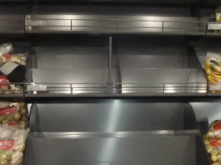 Multi-tier steel retail display shelving fabricated by a UK sheet metal contractor